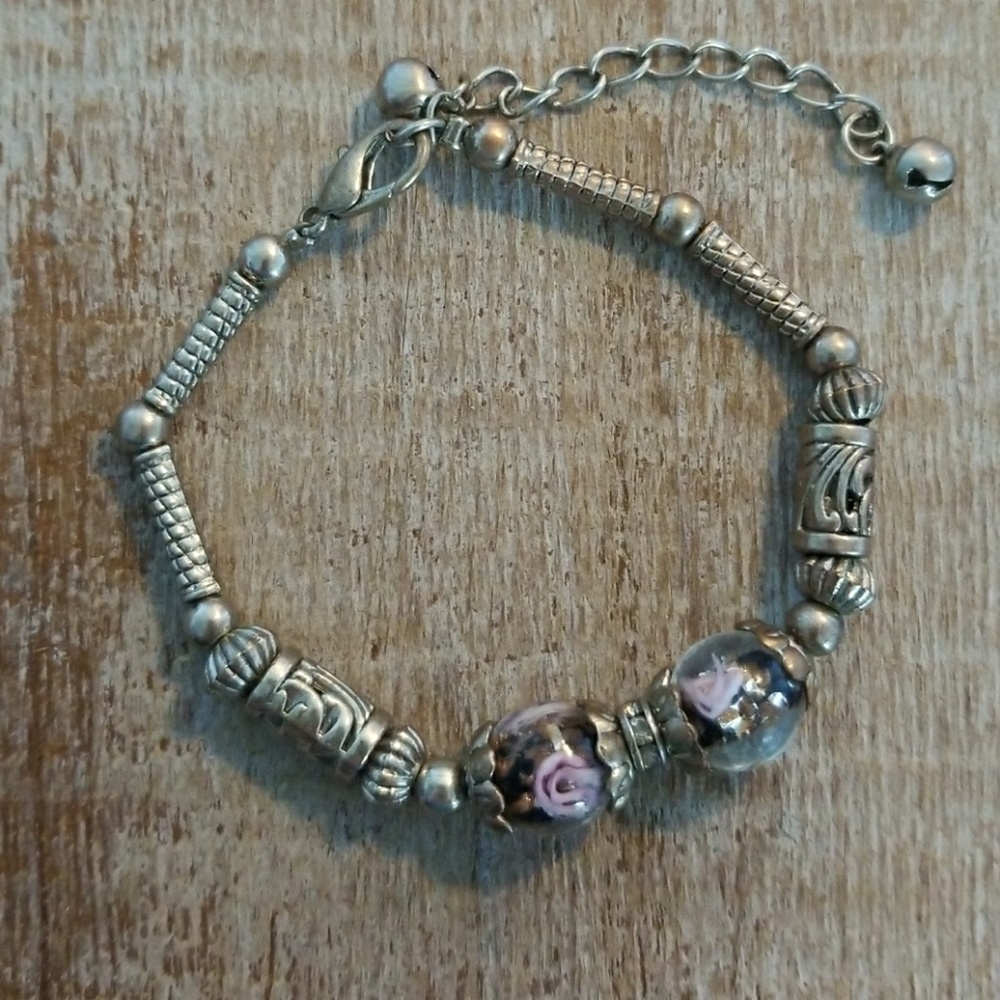 Silver bracelet with beeds and bells